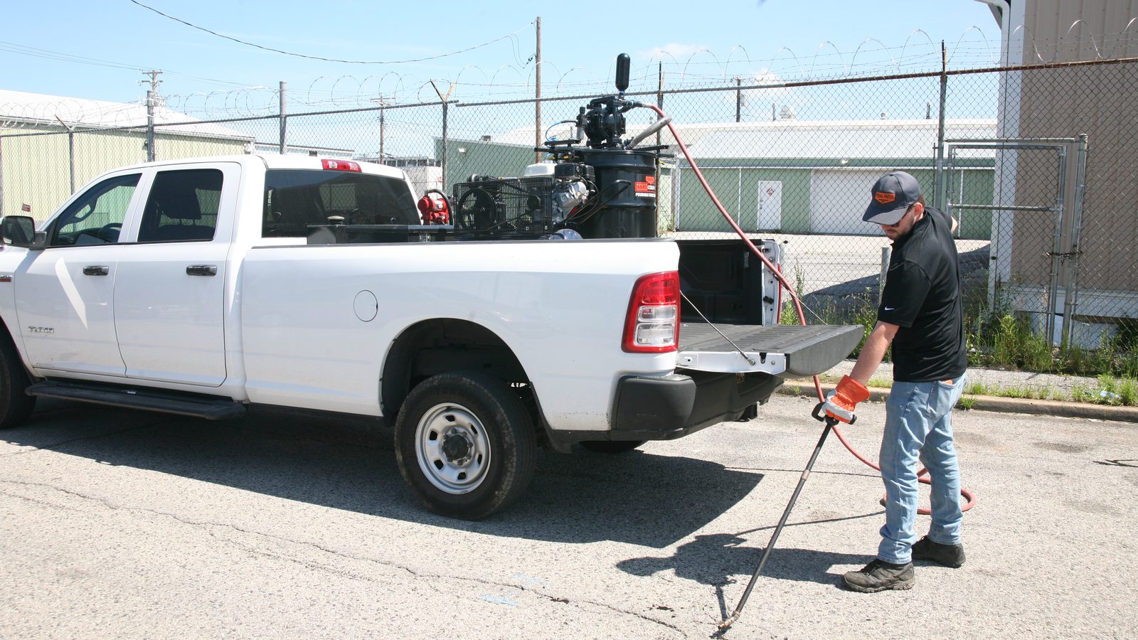 NTTA crew applying ColdFuze cold-applied crack sealant, a safer alternative to hot kettle sealing
